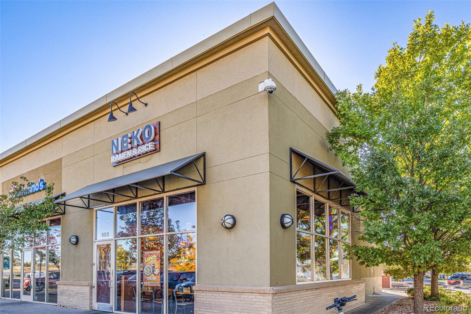 3854 Cook Street Denver, CO 80205 - Photo 41 of 42 a street sign on a street corner
