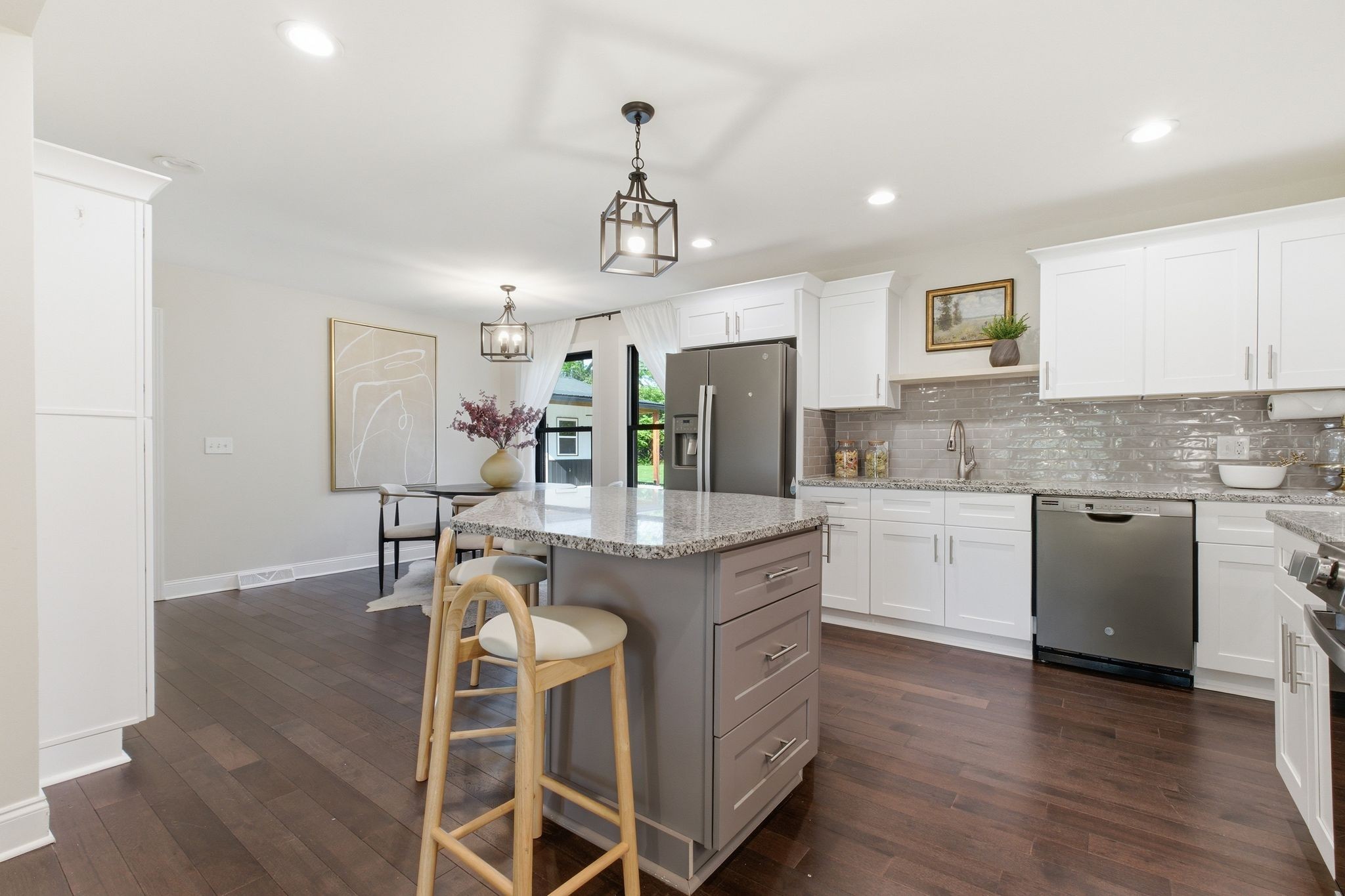 301 Rosebrook Drive Gallatin, TN 37066 - Photo 12 of 49 a kitchen with granite countertop cabinets a sink and stainless steel appliances