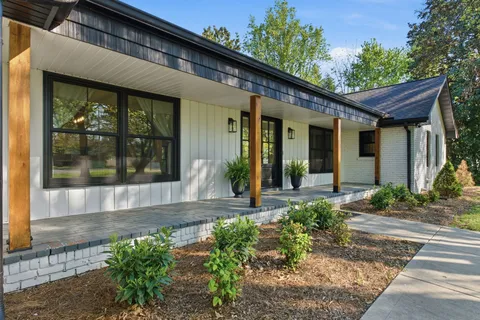 a view of a house with a small porch