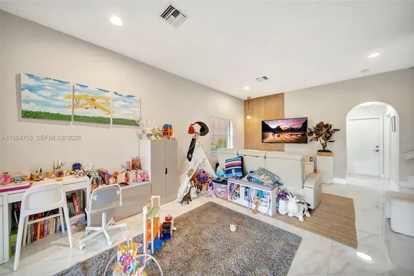 a view of entryway with wooden floor