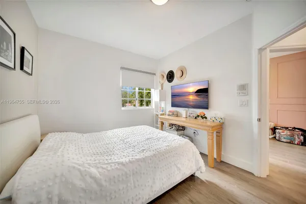 a bathroom with a bathtub and a sink