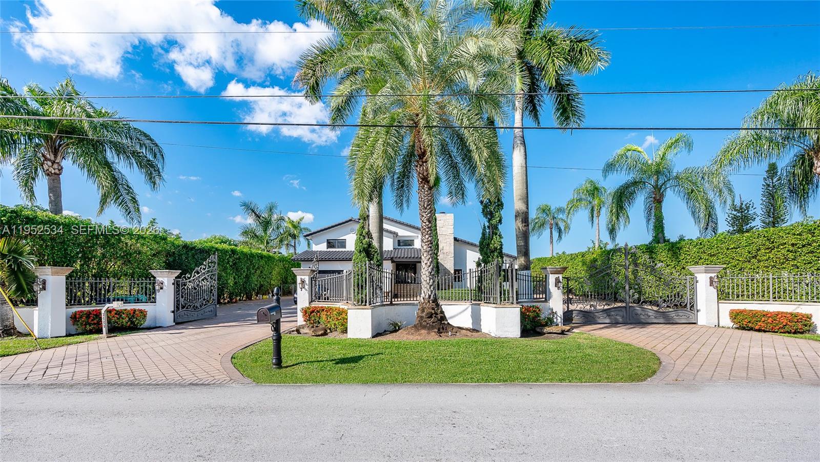 3420 Southwest 129th Avenue Miami, FL 33175 - Photo 3 of 7 a view of a house with a yard and potted plants