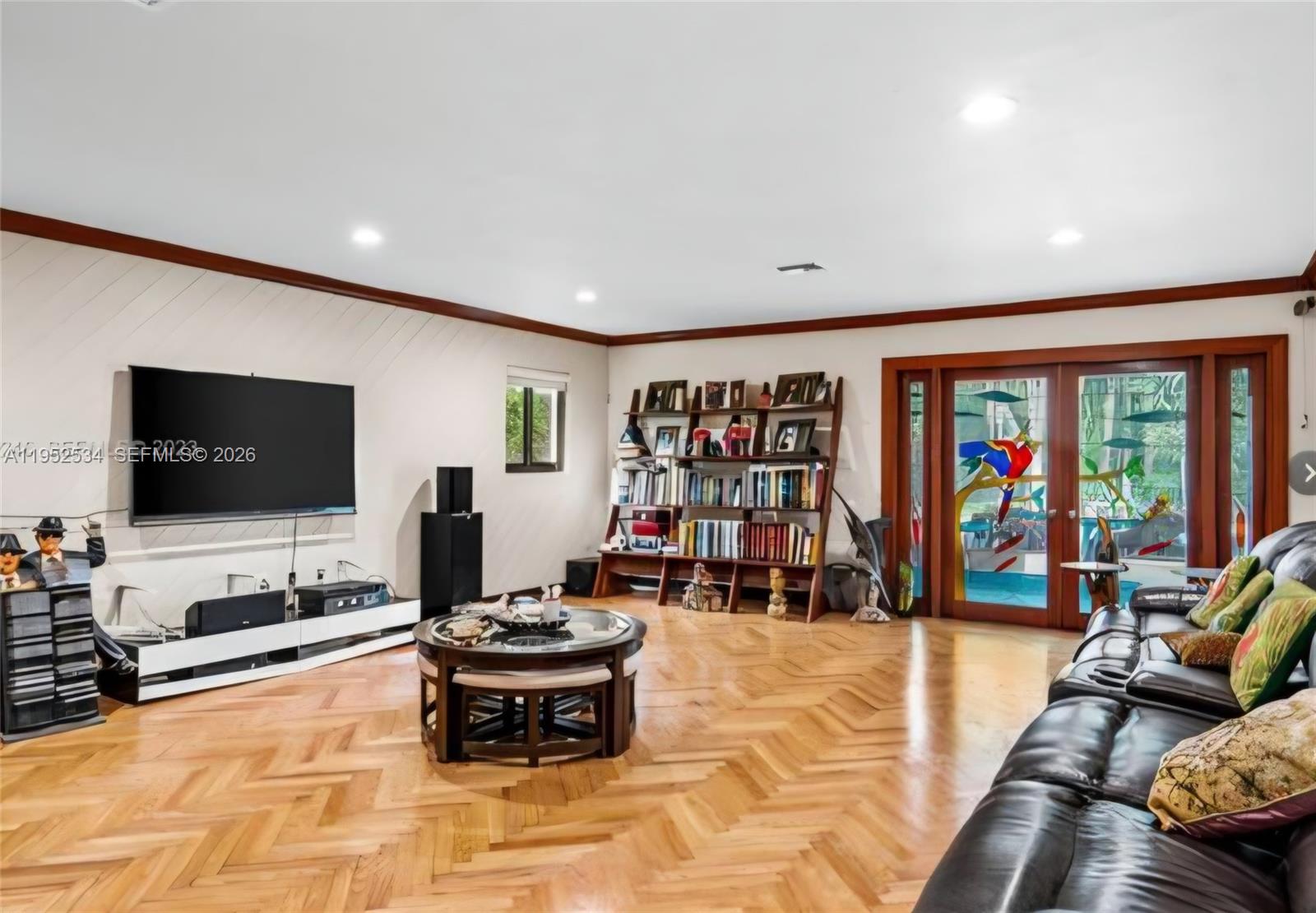 3420 Southwest 129th Avenue Miami, FL 33175 - Photo 5 of 7 a living room with furniture flat screen tv and floor to ceiling window
