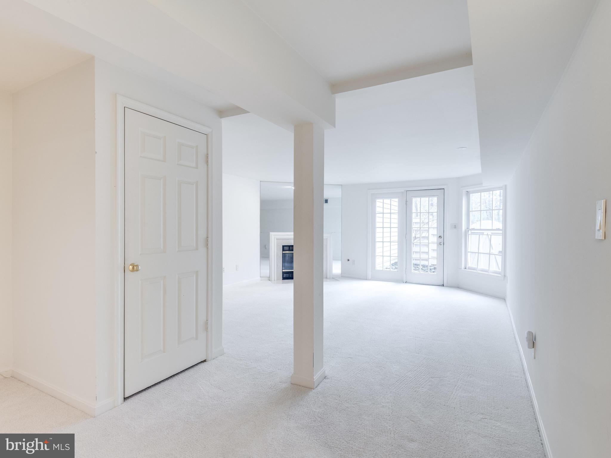 11442 Hollow Timber Court Reston, VA 20194 - Photo 23 of 29 Basement with family room and gas fireplace