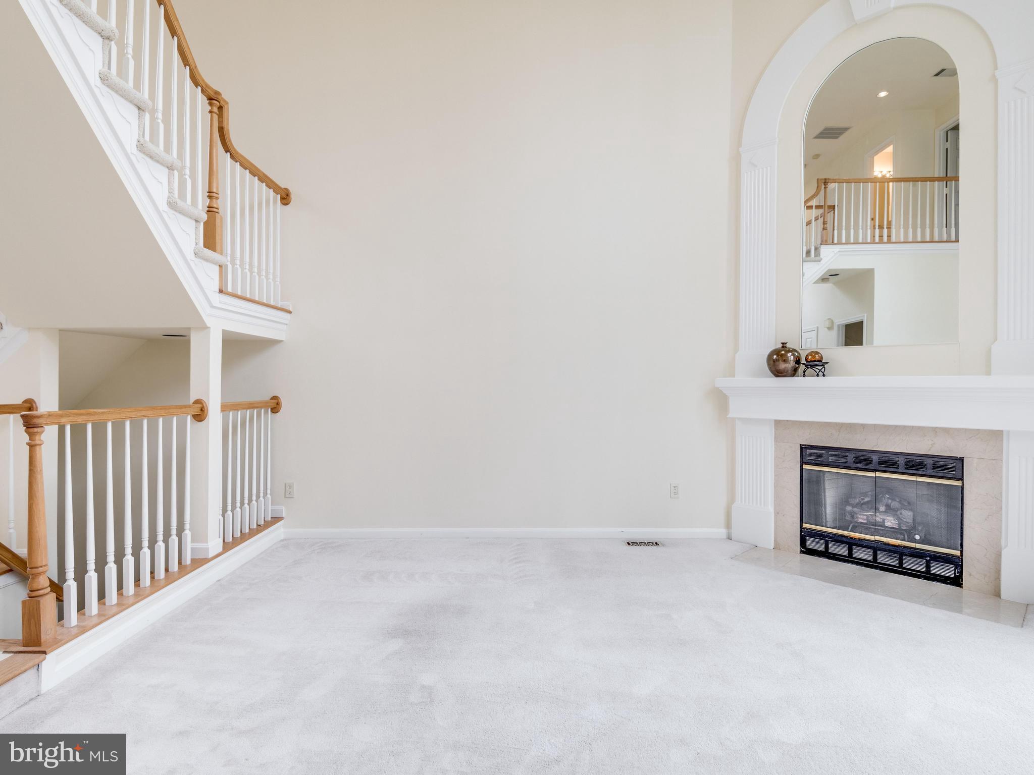 11442 Hollow Timber Court Reston, VA 20194 - Photo 6 of 29 Family Room with gas fireplace and mirrored mantel