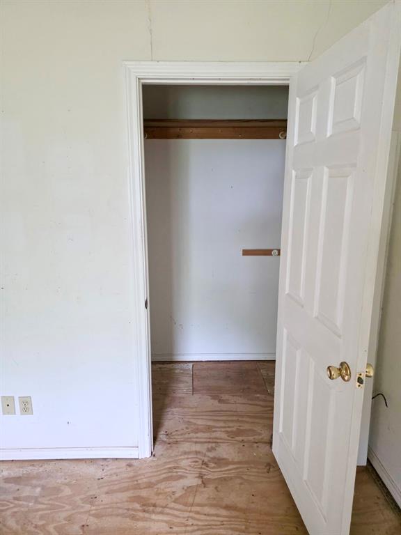 417 West Huffman Street Krum, TX 76249 - Photo 12 of 26 Closet space featuring a built-in hanging rod and a partial shelf