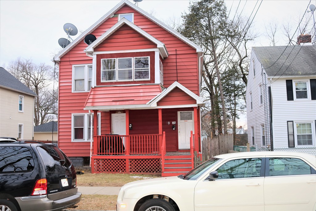 a front view of a house with garage