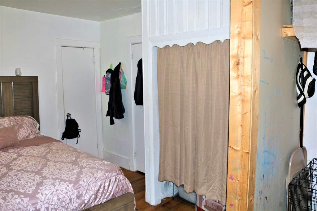 68-70 Appleton Street Springfield, MA 01108 - Photo 12 of 28 a bedroom with a bed and a window