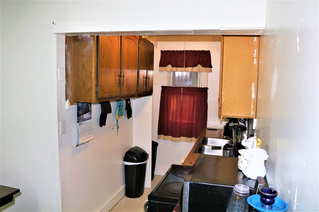 68-70 Appleton Street Springfield, MA 01108 - Photo 20 of 28 walk in closet with wooden floor