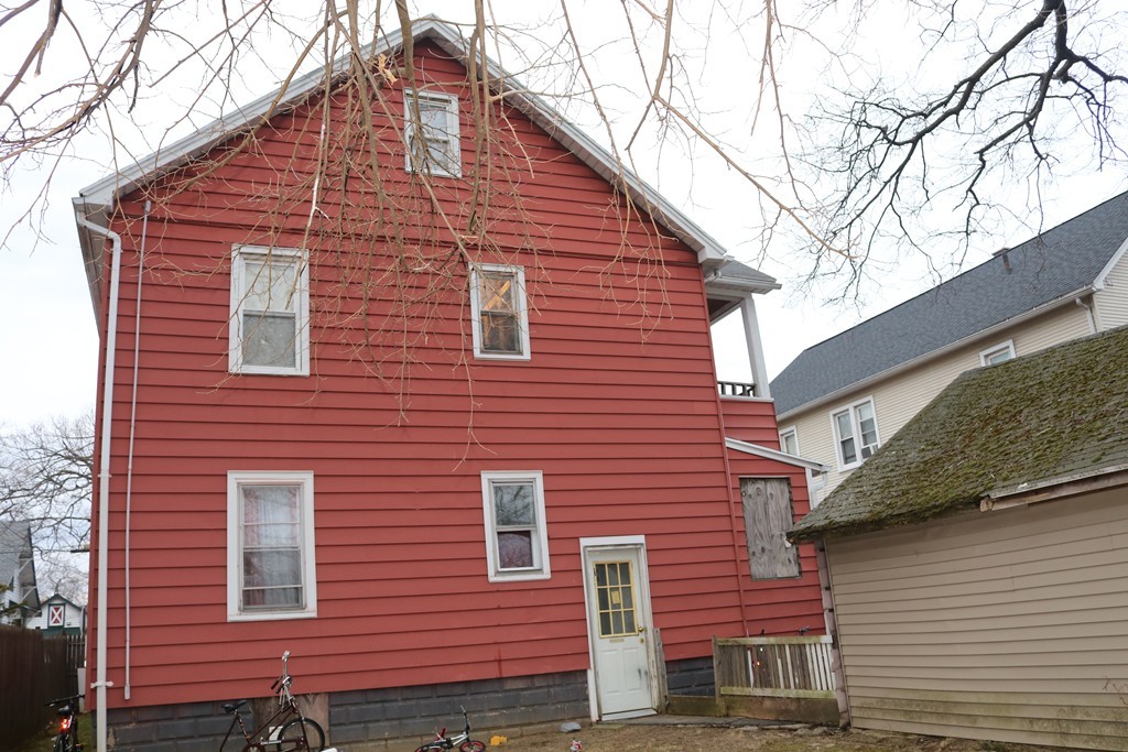 68-70 Appleton Street Springfield, MA 01108 - Photo 4 of 28 a front view of a house with large windows