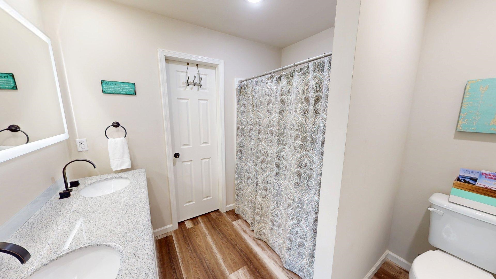 55 Bogey Loop Counce, TN 38326 - Photo 14 of 32 a bathroom with a sink toilet and shower