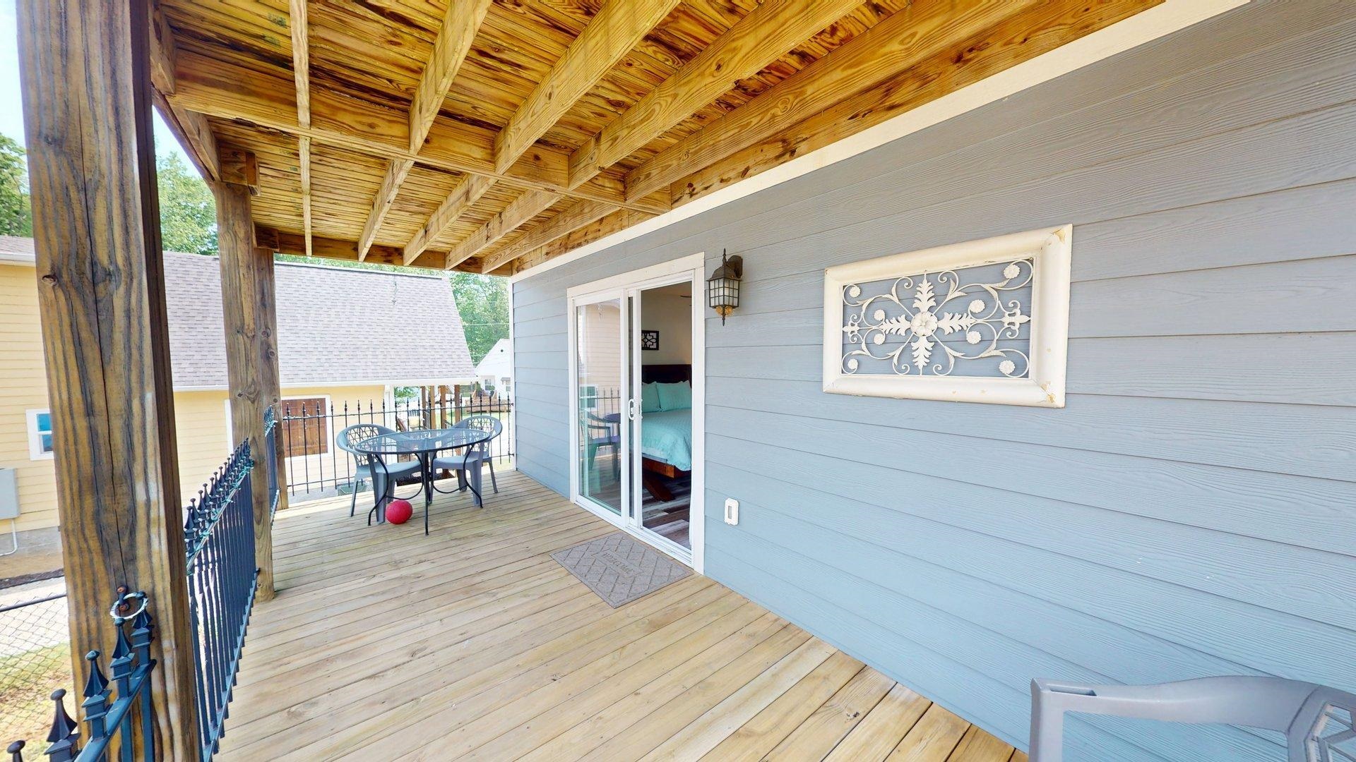 55 Bogey Loop Counce, TN 38326 - Photo 16 of 32 a view of a porch with furniture and a yard
