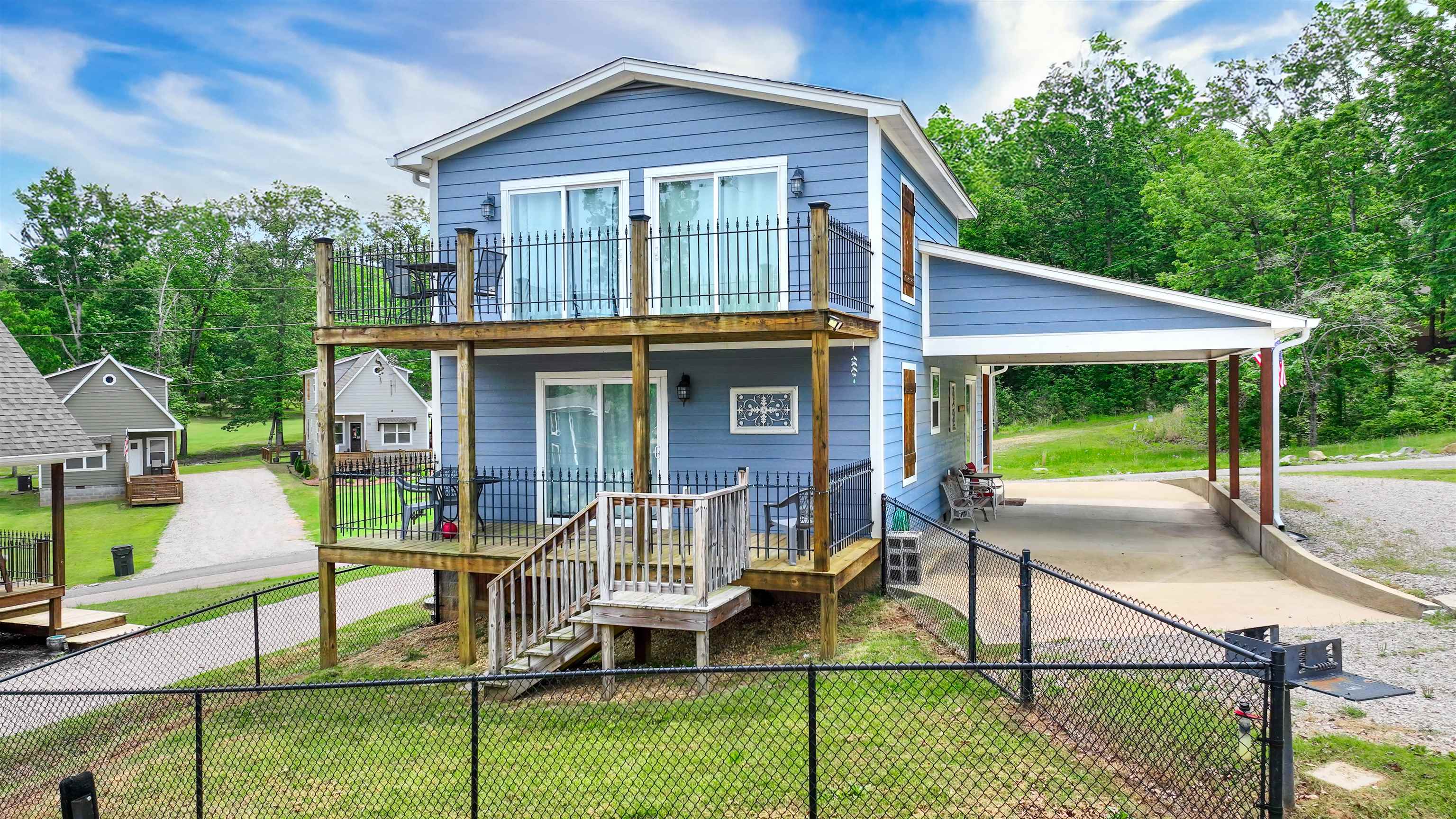 55 Bogey Loop Counce, TN 38326 - Photo 2 of 32 a view of house with a yard