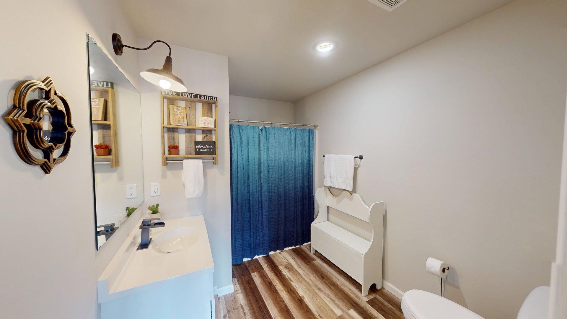 55 Bogey Loop Counce, TN 38326 - Photo 22 of 32 a bathroom with a sink a toilet and shower