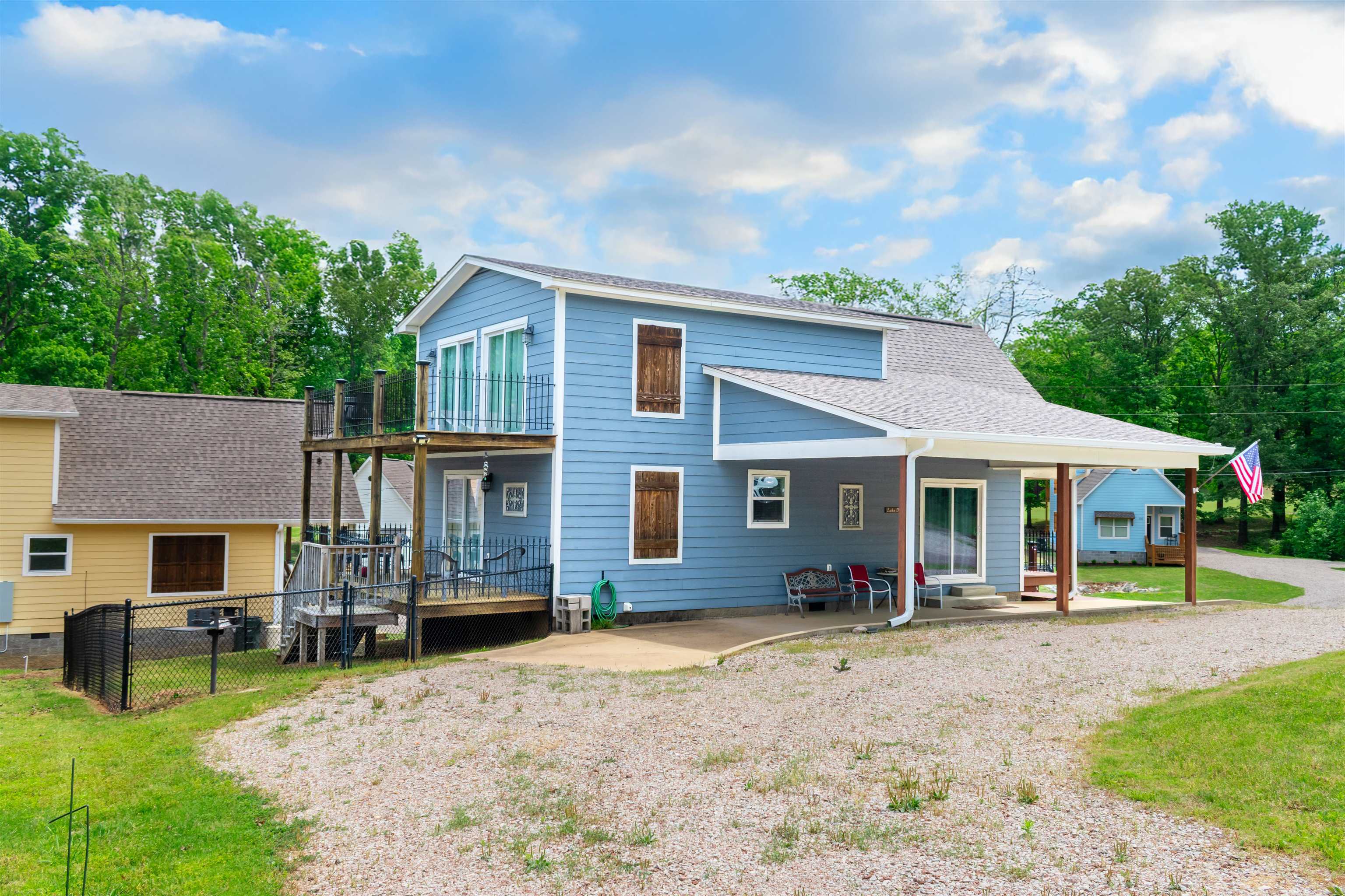 55 Bogey Loop Counce, TN 38326 - Photo 31 of 32 a view of a house with a backyard and sitting area