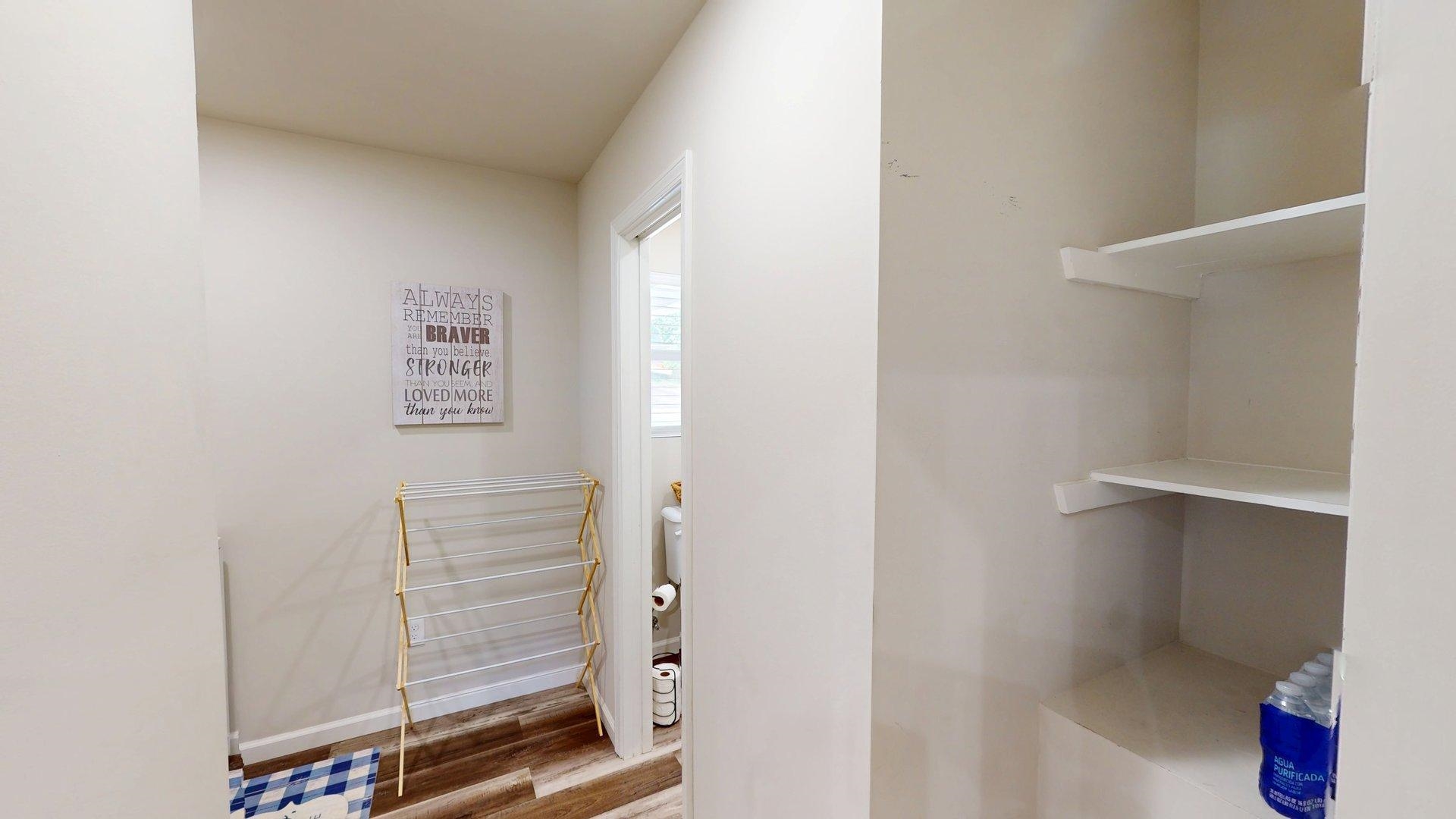 55 Bogey Loop Counce, TN 38326 - Photo 10 of 32 a view of walk in closet with clothes and shoes