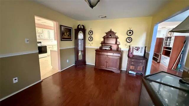 a view of a livingroom with wooden floor