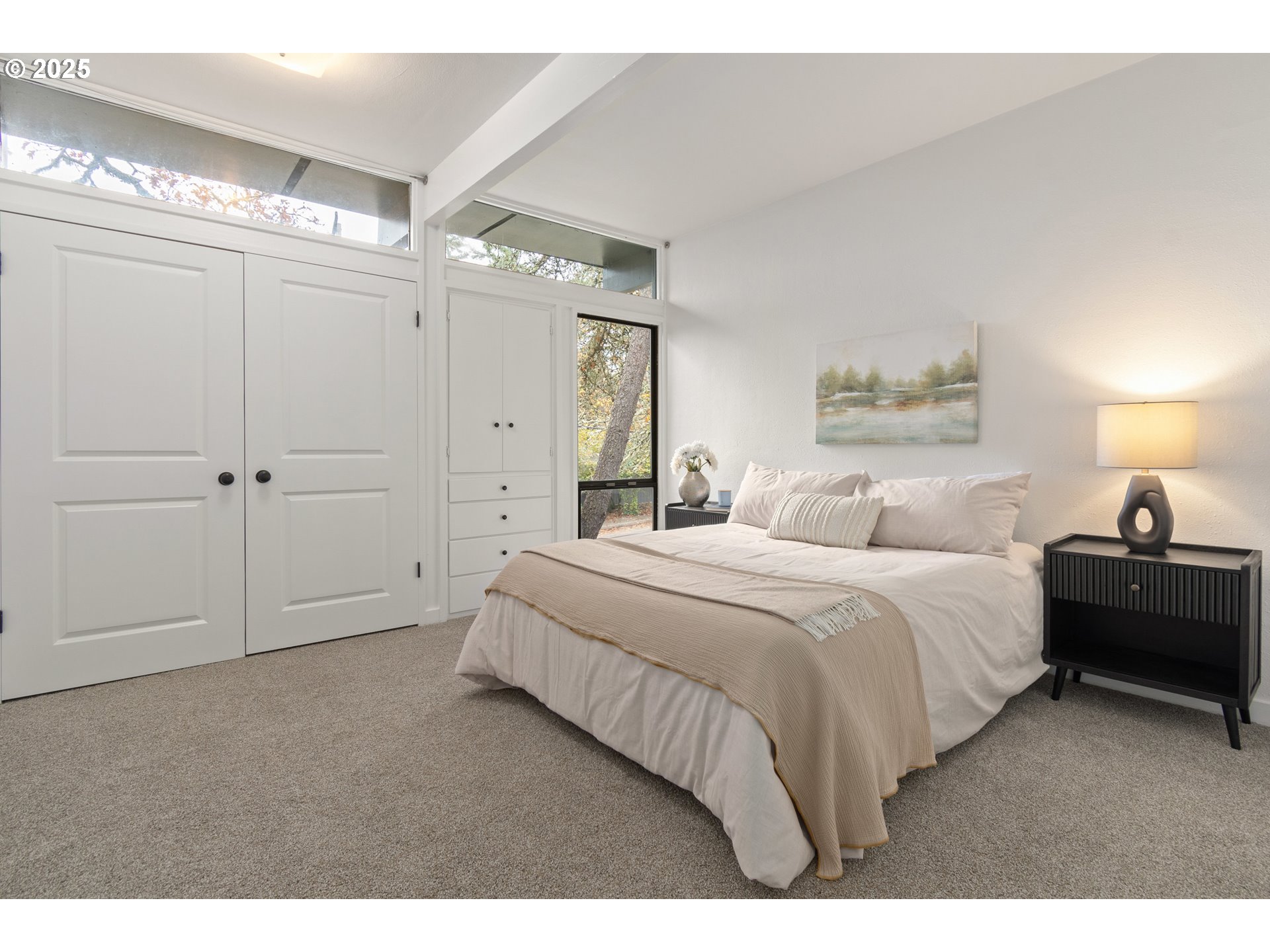 3820 Watkins Lane Eugene, OR 97405 - Photo 32 of 48 a bedroom with a bed and a chandelier