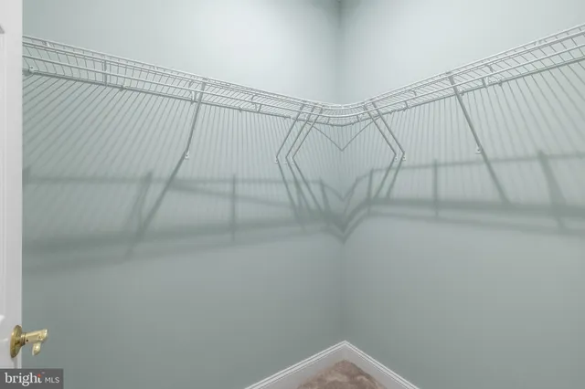 a view of a room with racks on the wall