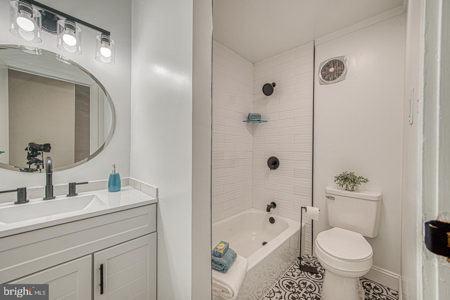 533 Summit House, Unit 533 West Chester, PA 19382 - Photo 16 of 18 a bathroom with a sink toilet and shower