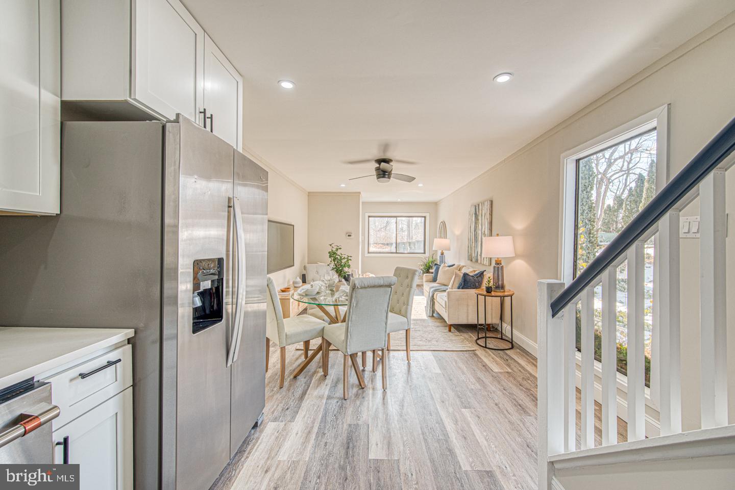 533 Summit House, Unit 533 West Chester, PA 19382 - Photo 9 of 18 a living room with furniture and a wooden floor