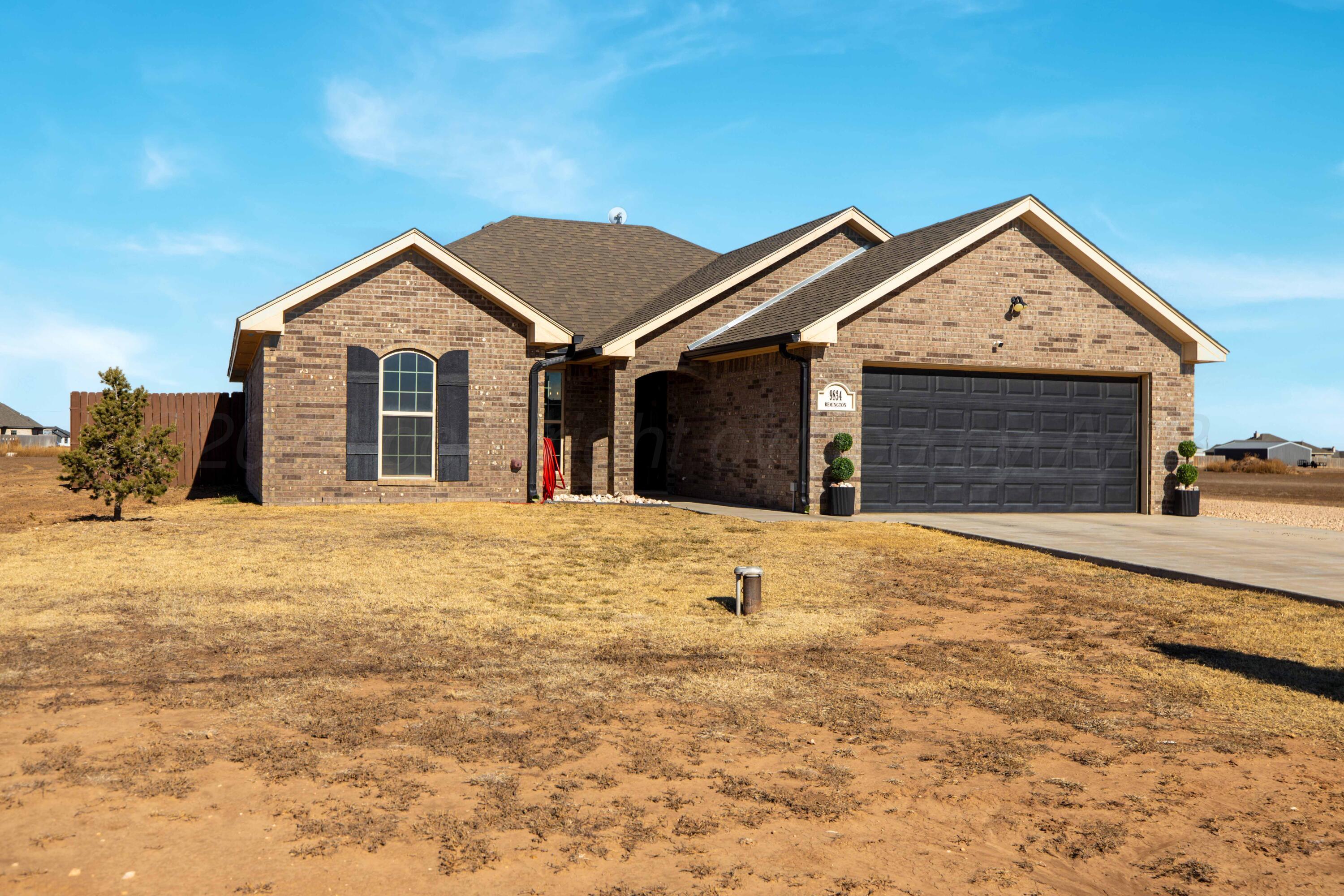 a view of outdoor space yard and front view of a house