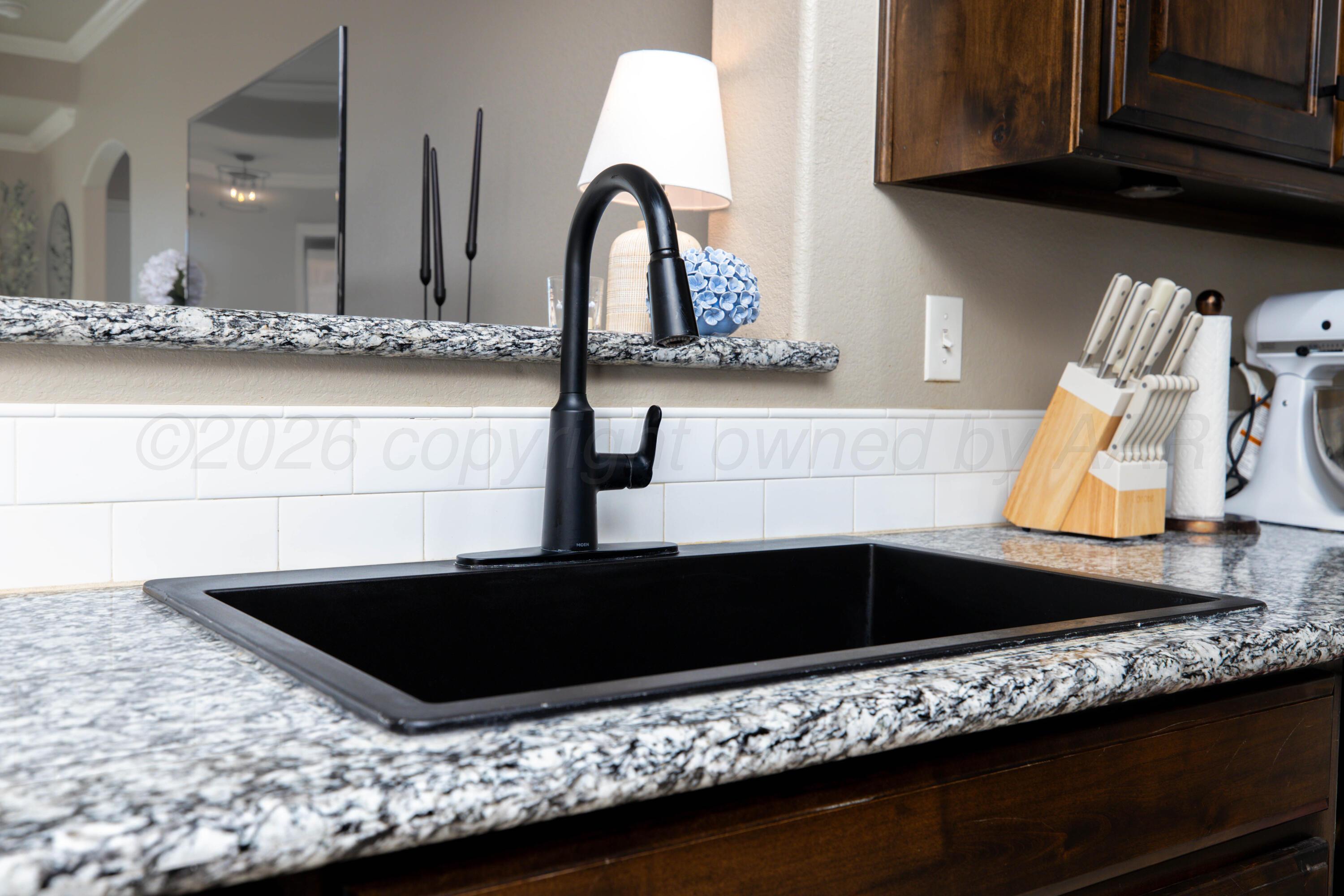 9834 Remington Road Canyon, TX 79015 - Photo 11 of 46 a close view of sink and tap