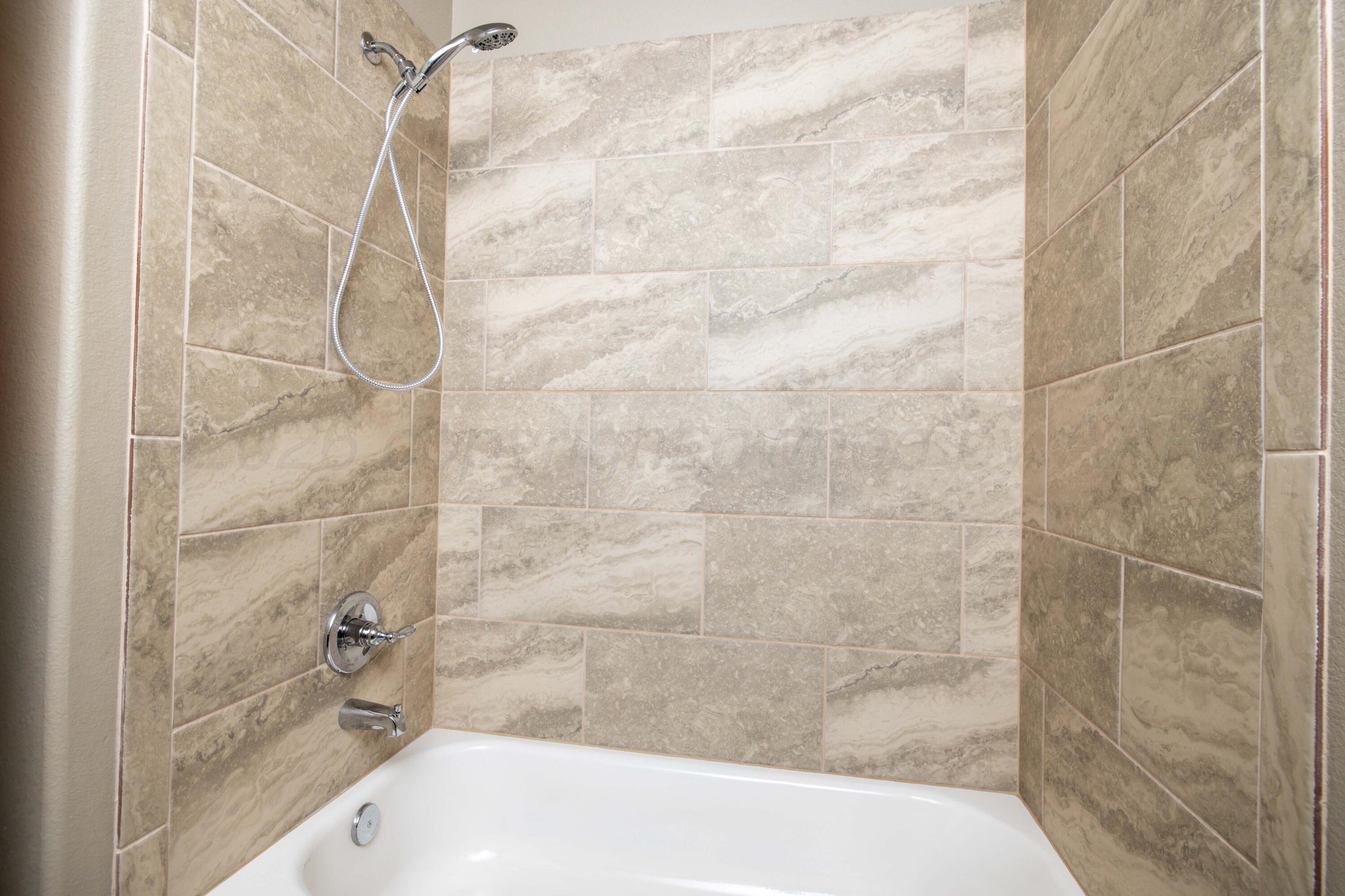 9834 Remington Road Canyon, TX 79015 - Photo 26 of 46 a bathroom with a bathtub