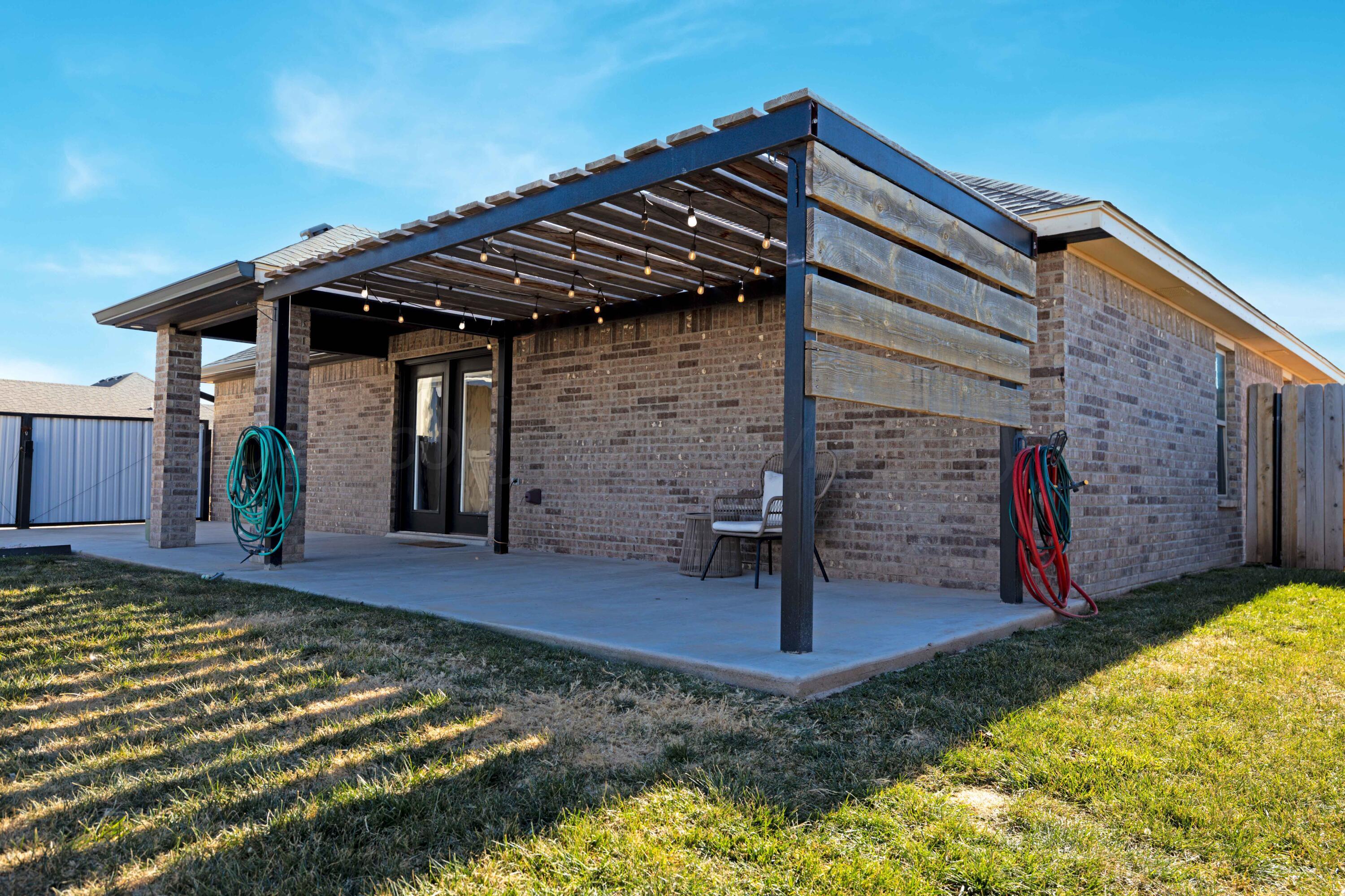 9834 Remington Road Canyon, TX 79015 - Photo 29 of 46 a view of a house with a swimming pool