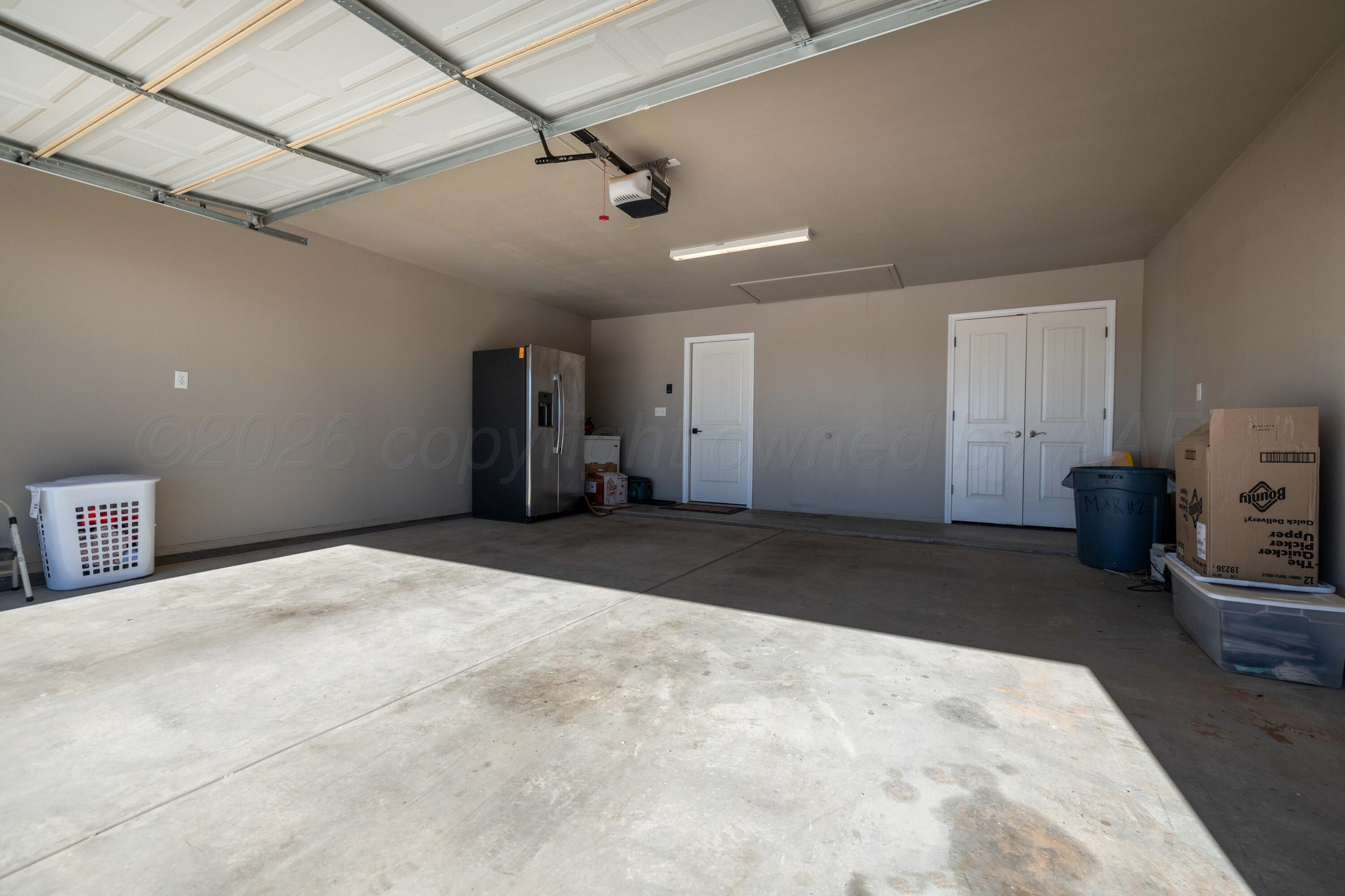 9834 Remington Road Canyon, TX 79015 - Photo 33 of 46 a big room with closet and flat screen tv