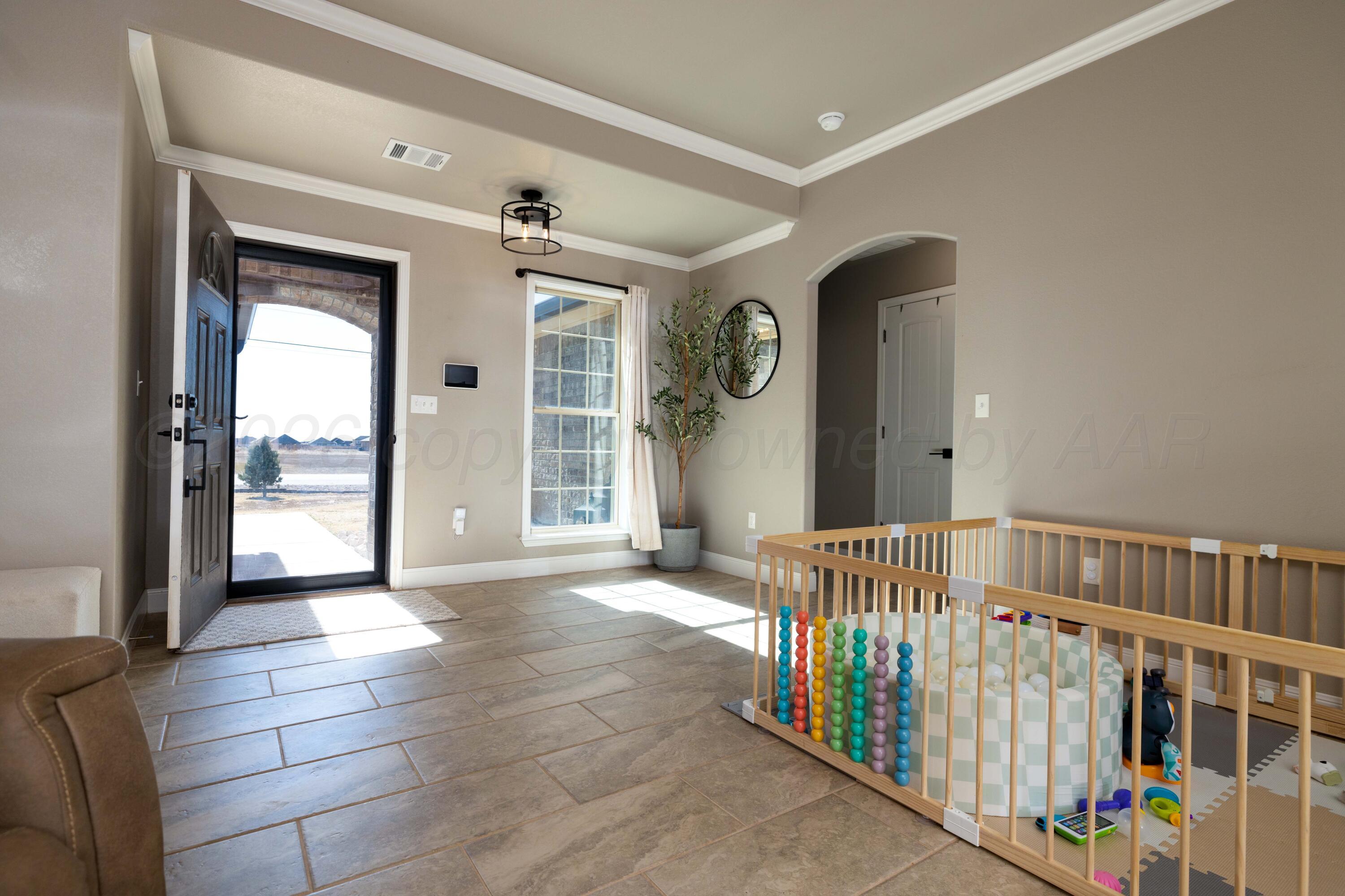 9834 Remington Road Canyon, TX 79015 - Photo 4 of 46 a view of an entryway with a livingroom
