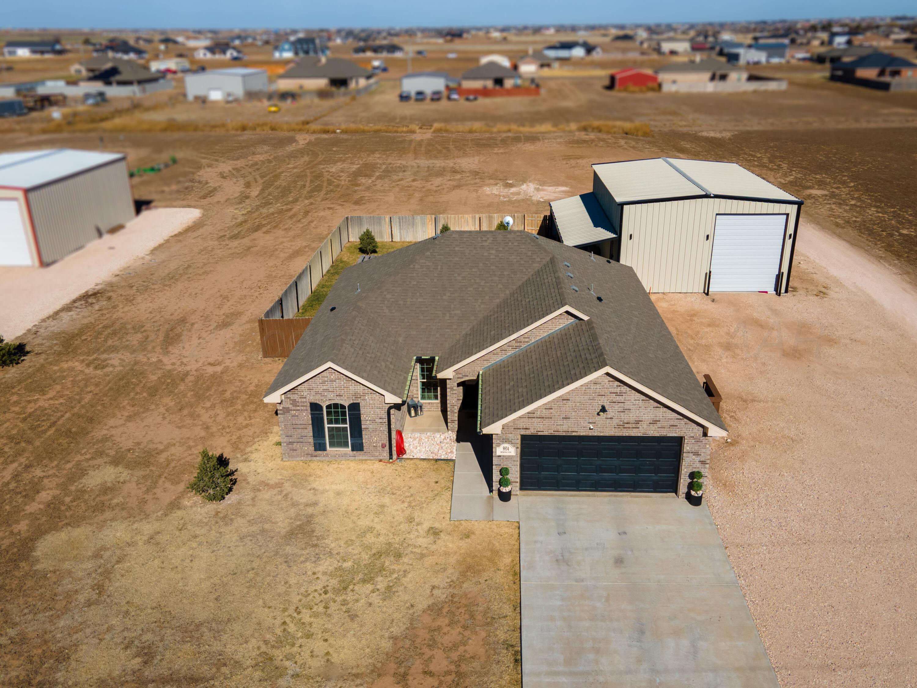 9834 Remington Road Canyon, TX 79015 - Photo 42 of 46 an aerial view of a house with a ocean view