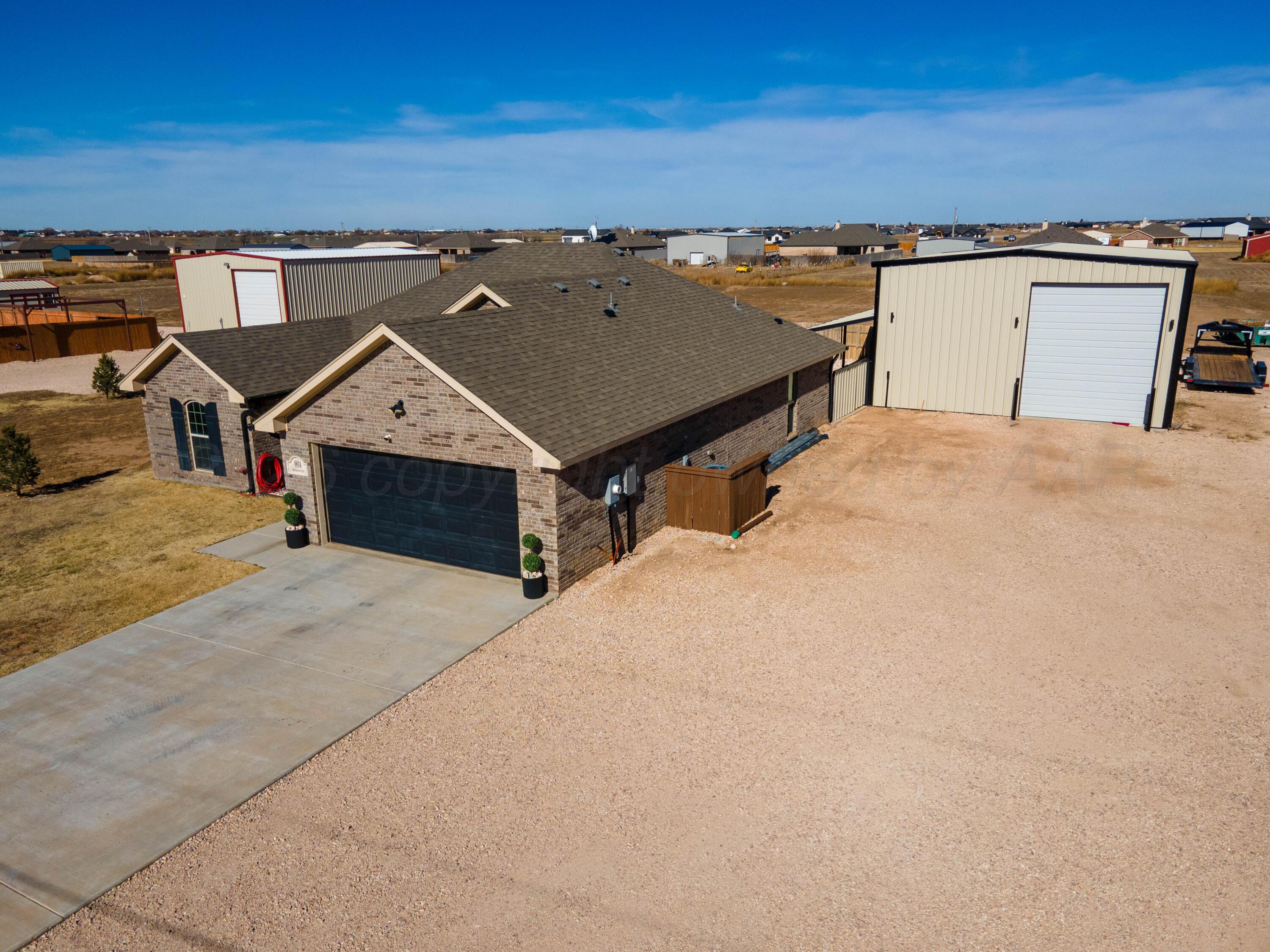 9834 Remington Road Canyon, TX 79015 - Photo 44 of 46 a front view of a house with a yard
