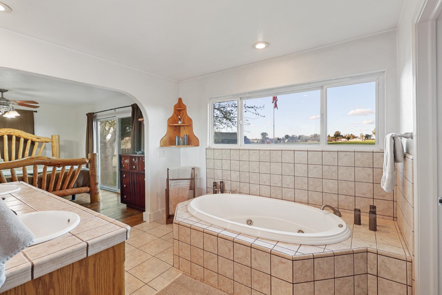 10691 Calvine Road Sacramento, CA 95830 - Photo 26 of 47 a bathroom with a bathtub and sink
