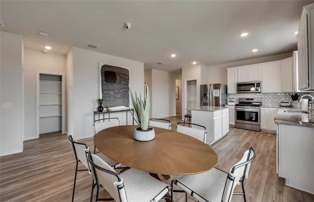 14053 Ladbroke Street Pilot Point, TX 76258 - Photo 8 of 19 Dining area off kitchen with large windows