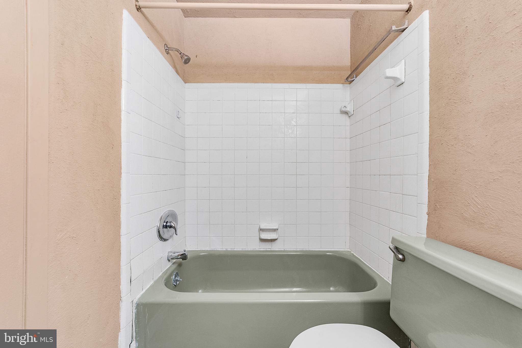803 Timber Creek Road Clementon, NJ 08021 - Photo 19 of 26 a bathroom with a tub