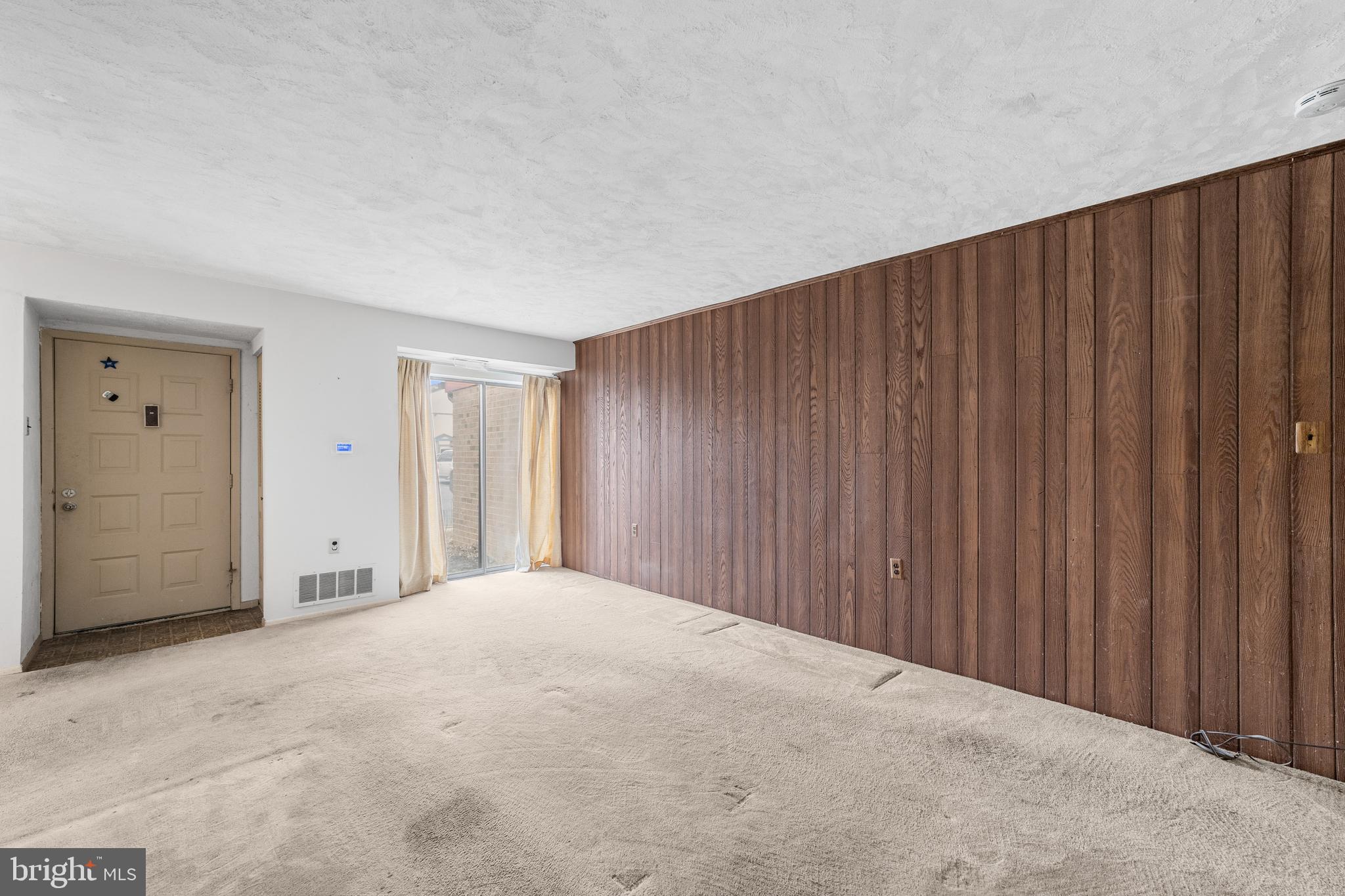 803 Timber Creek Road Clementon, NJ 08021 - Photo 26 of 26 a view of a livingroom with a wooden door