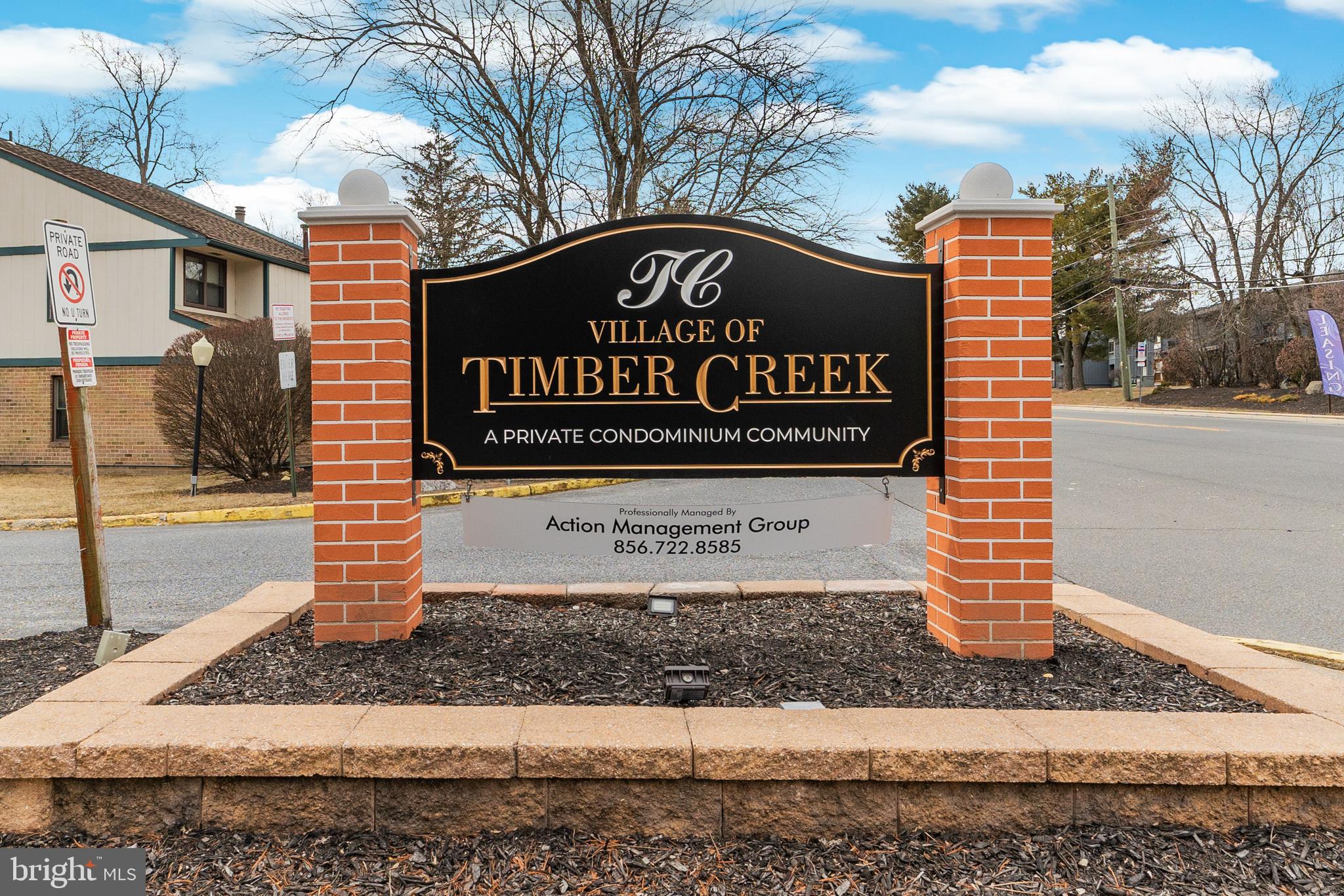 803 Timber Creek Road Clementon, NJ 08021 - Photo 4 of 26 a view of a street with houses