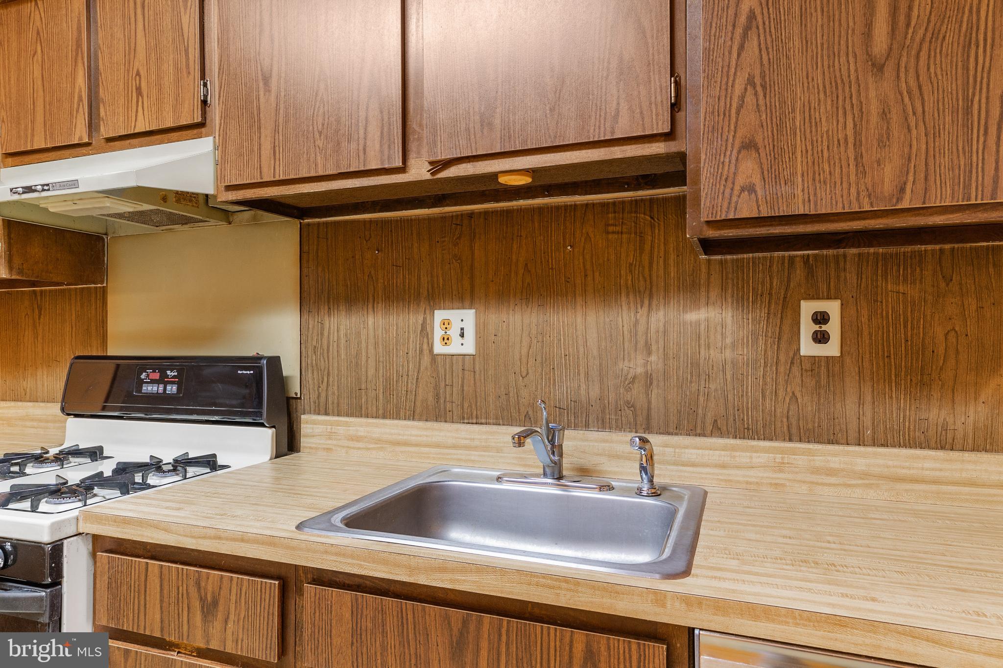 803 Timber Creek Road Clementon, NJ 08021 - Photo 7 of 26 a kitchen with a sink and cabinets