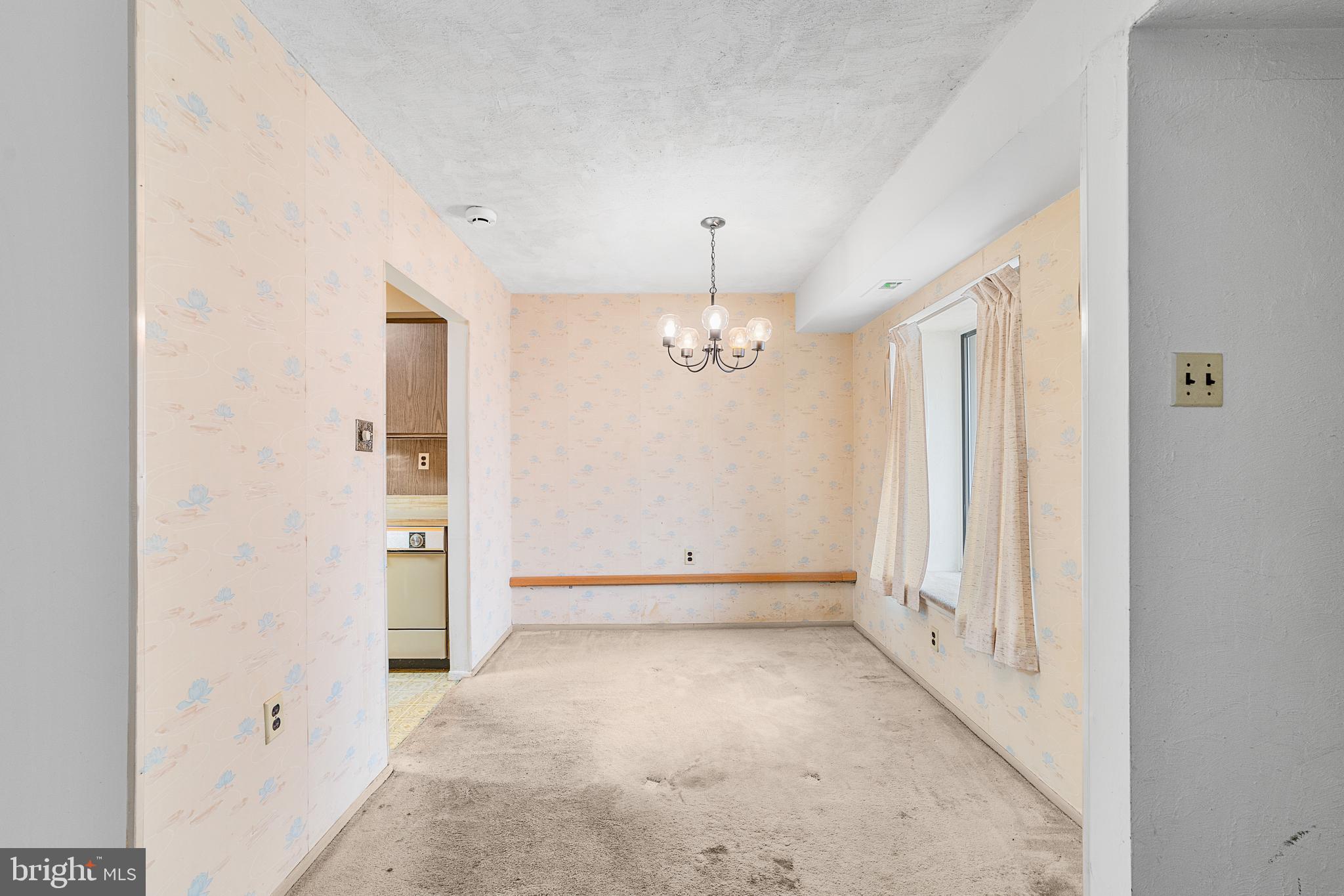 803 Timber Creek Road Clementon, NJ 08021 - Photo 9 of 26 wooden floor in an empty room with a window