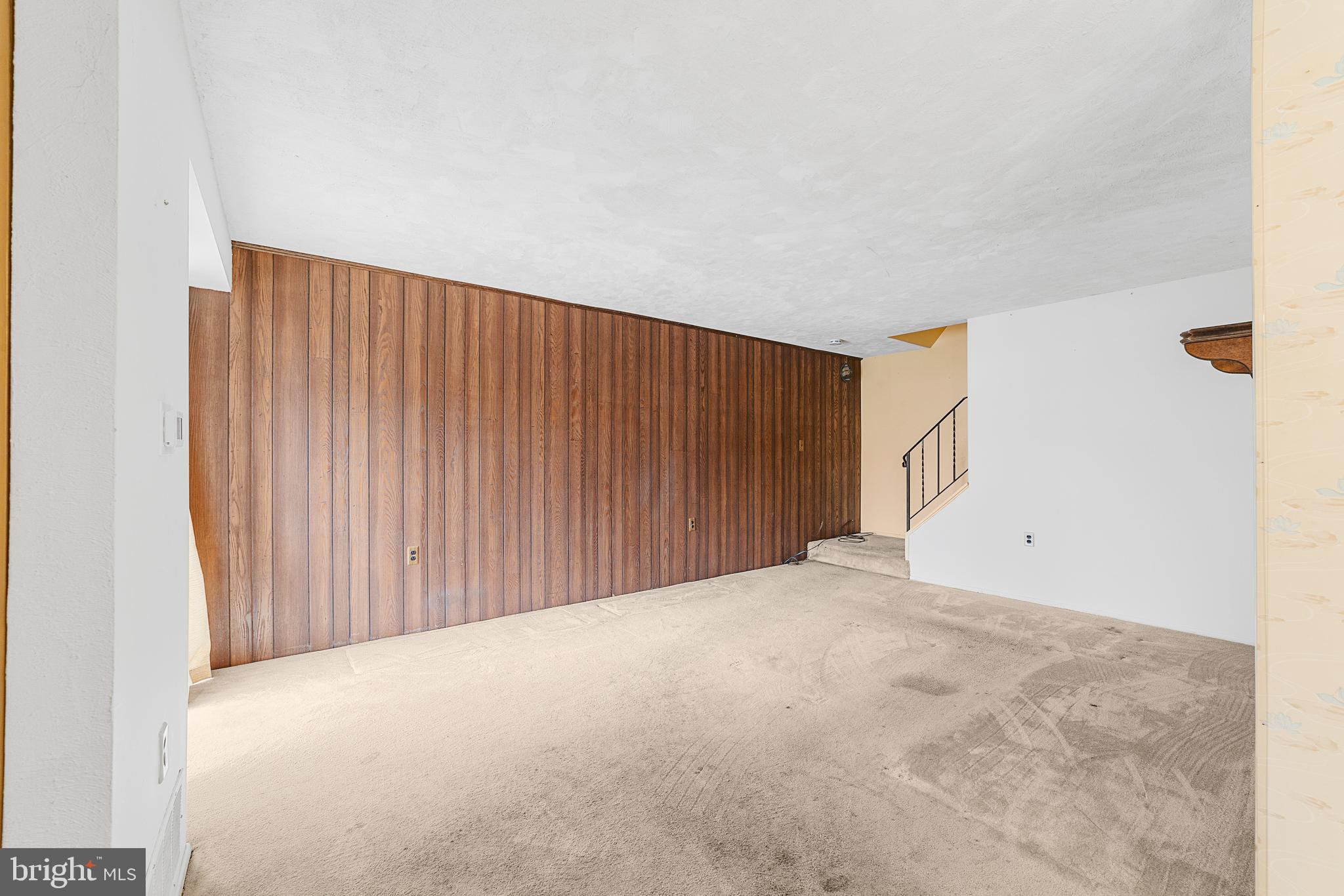 803 Timber Creek Road Clementon, NJ 08021 - Photo 10 of 26 a view of an empty room with wooden floor