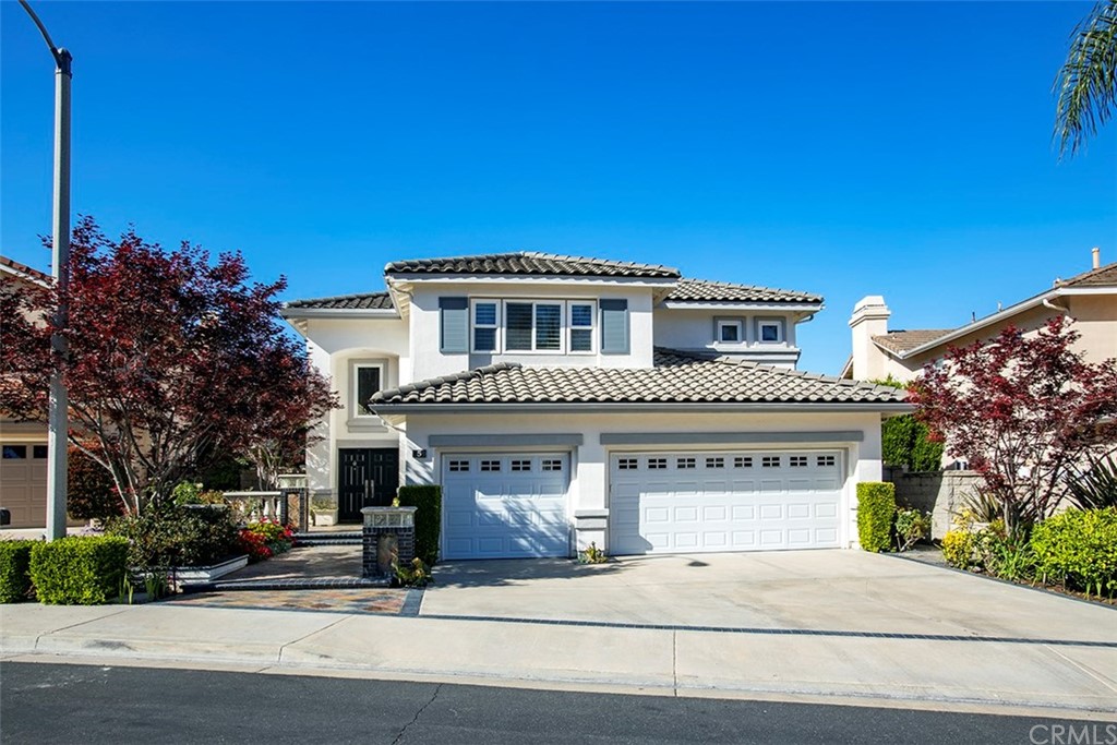 5 Daystar Irvine, CA 92612 - Photo 1 of 1 a front view of a house with garage