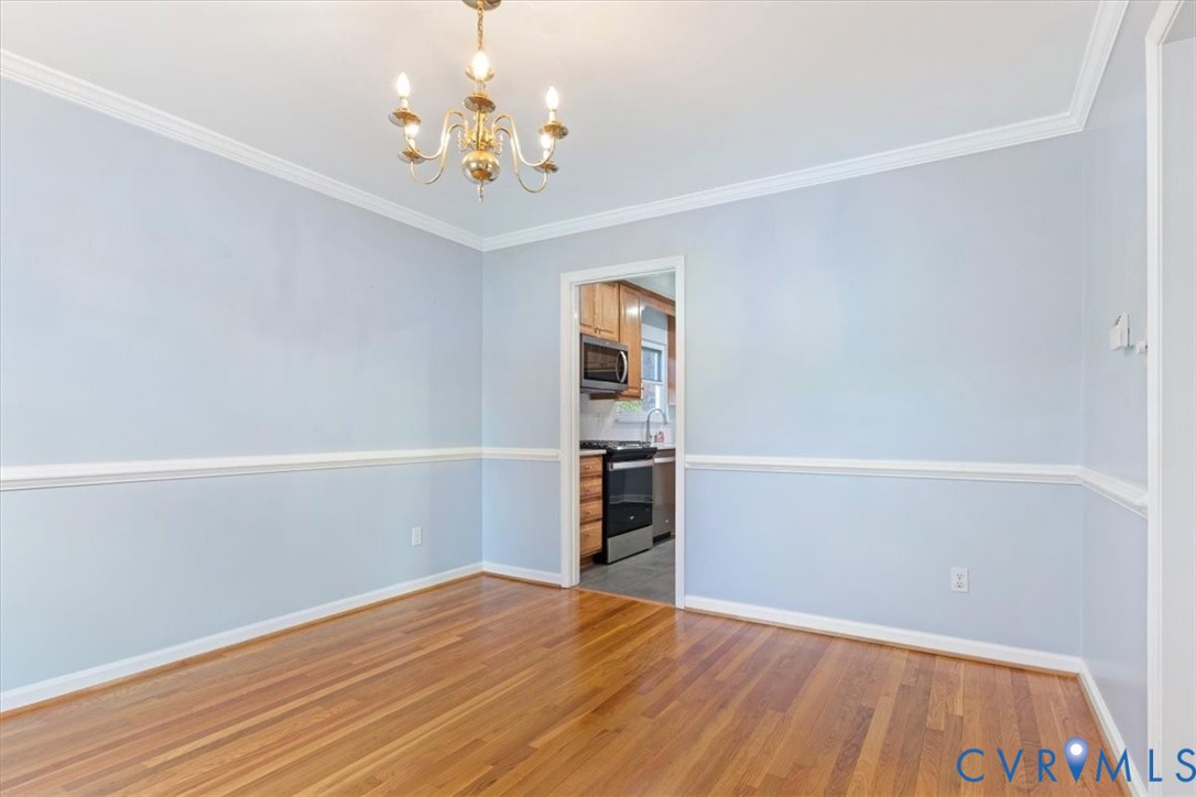 2502 Landon Road Richmond, VA 23294 - Photo 11 of 26 a view of an empty room with wooden floor