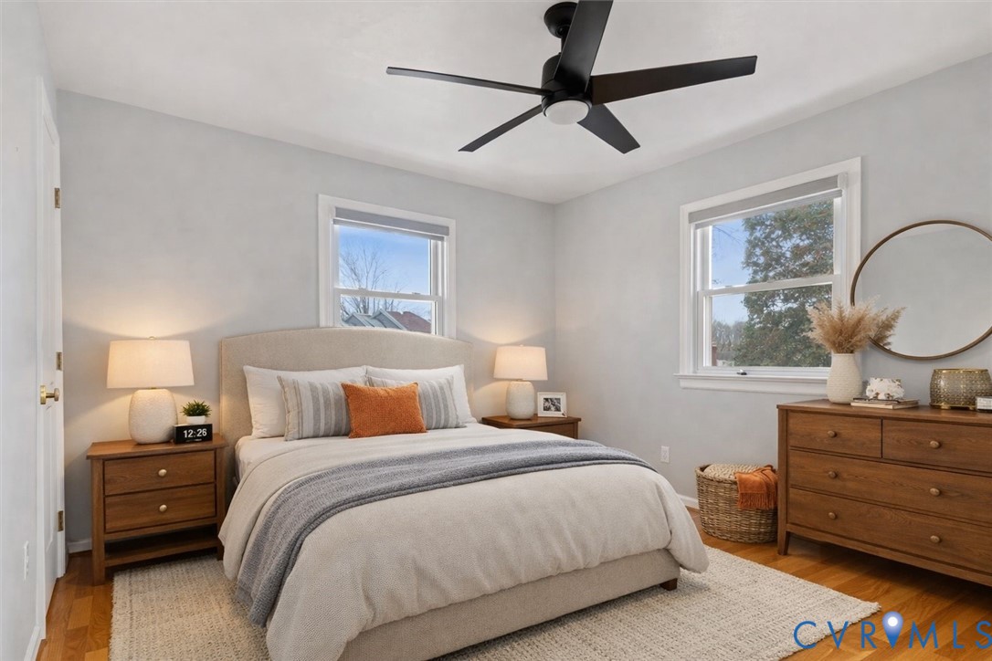 2502 Landon Road Richmond, VA 23294 - Photo 17 of 26 a bedroom with a bed and a dresser