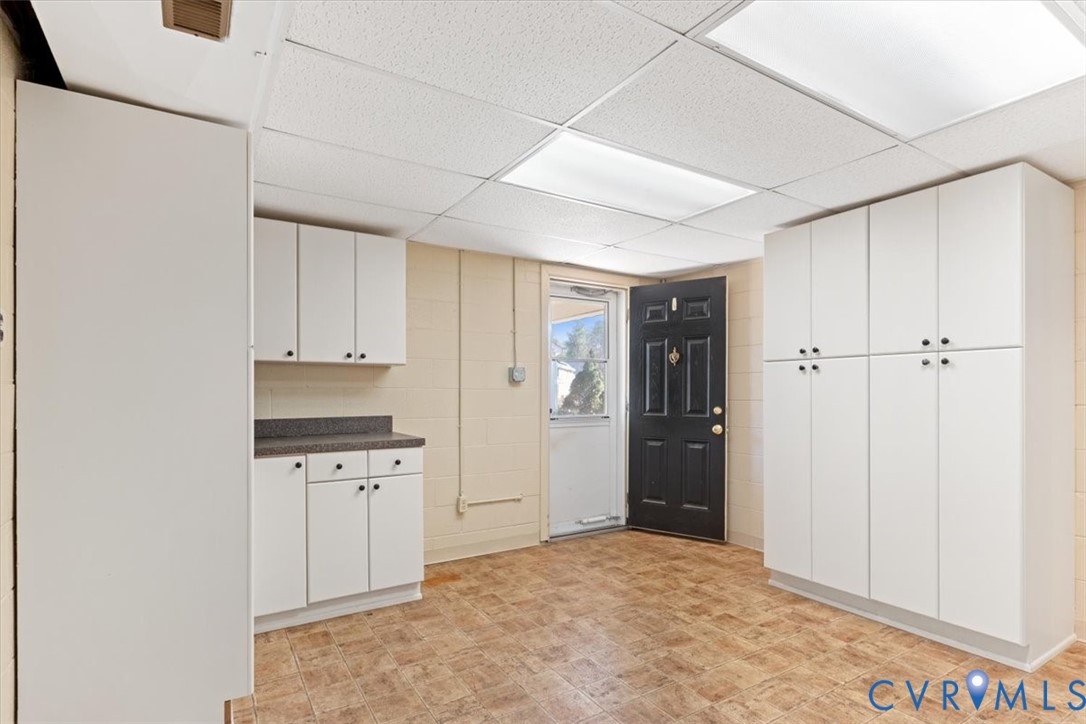 2502 Landon Road Richmond, VA 23294 - Photo 21 of 26 a view of a kitchen with a sink and cabinets