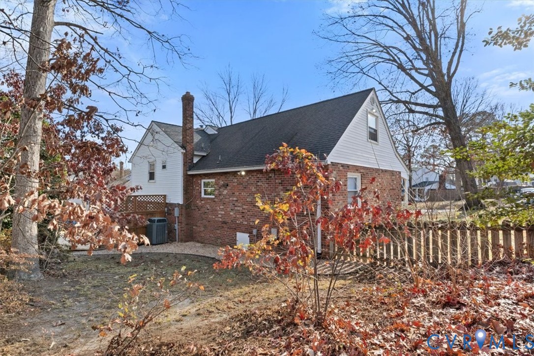 2502 Landon Road Richmond, VA 23294 - Photo 23 of 26 a view of a wooden house with a large tree