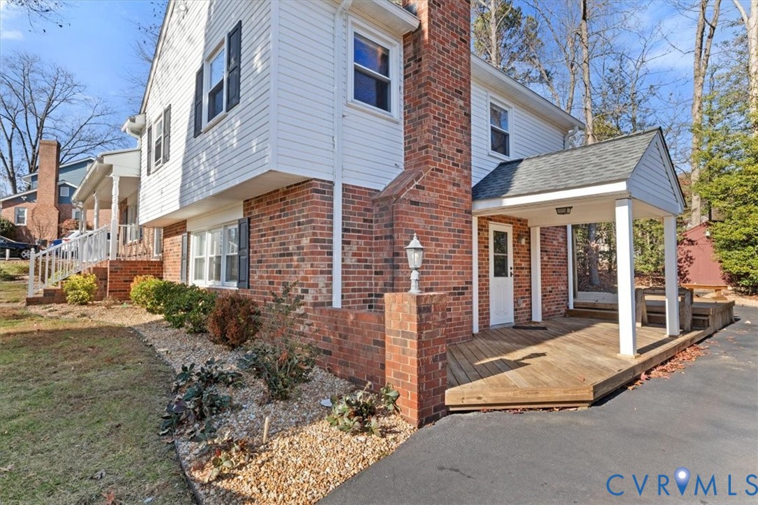 2502 Landon Road Richmond, VA 23294 - Photo 24 of 26 a view of a brick house with many windows