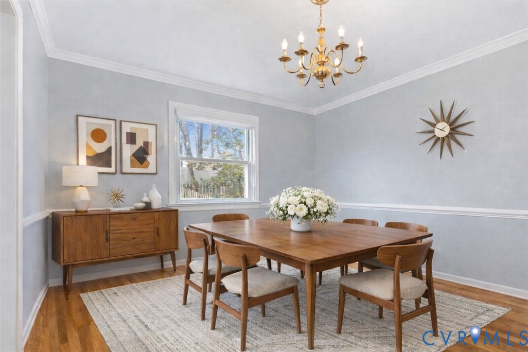 2502 Landon Road Richmond, VA 23294 - Photo 4 of 26 a dining room with furniture and chandelier
