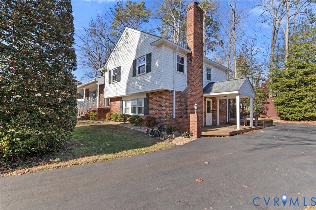 2502 Landon Road Richmond, VA 23294 - Photo 6 of 26 front view of a house with a street