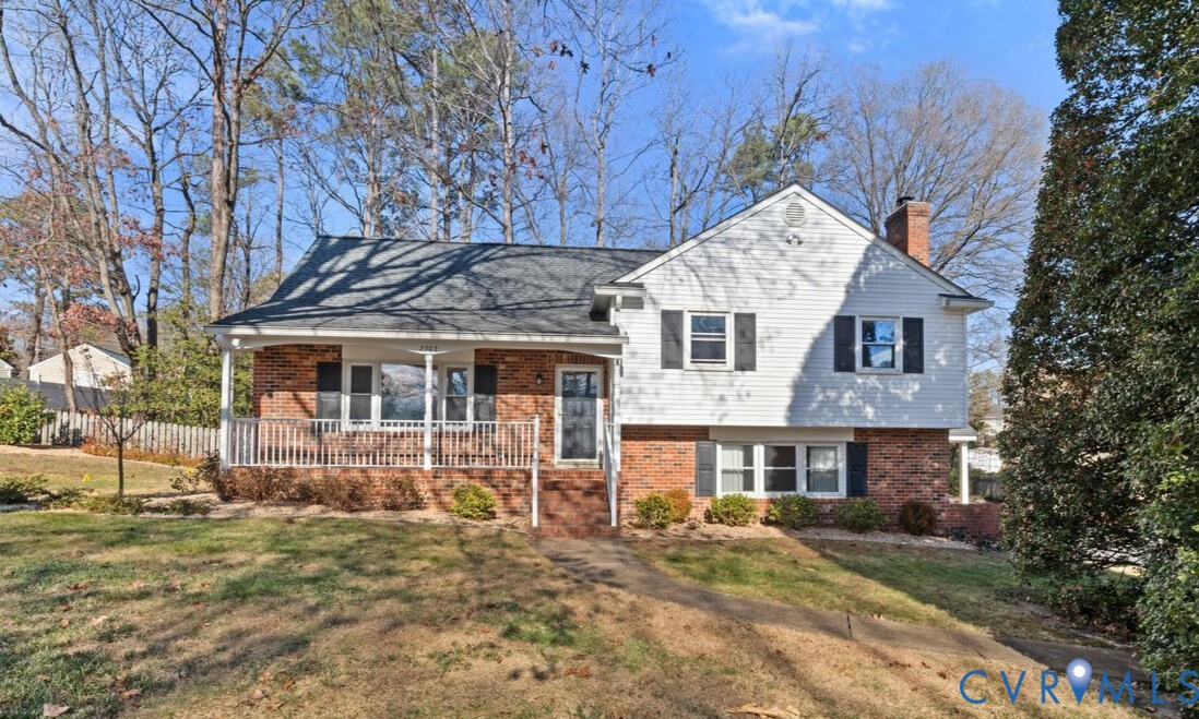 2502 Landon Road Richmond, VA 23294 - Photo 7 of 26 a front view of a house with a yard